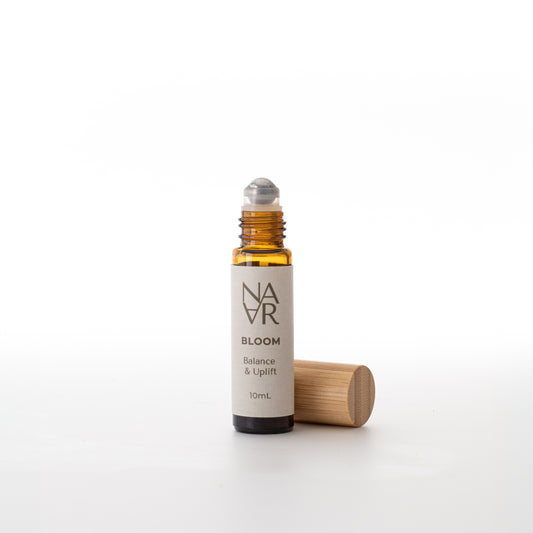 Bloom Roller with natural ingredients, to balance and uplift in eco-friendly glass roller bottle. Wellness for Women /NARA