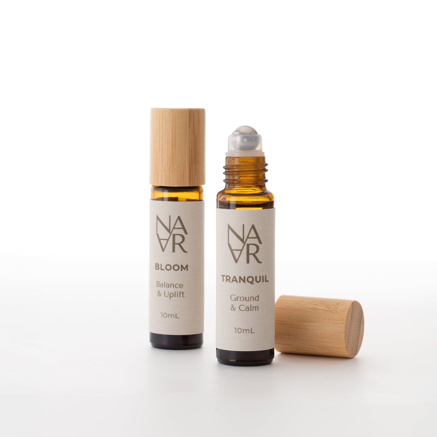 Bloom Roller & Tranquil Roller with natural ingredients, to balance and uplift in eco-friendly glass roller bottle. Wellness for Women /NARA