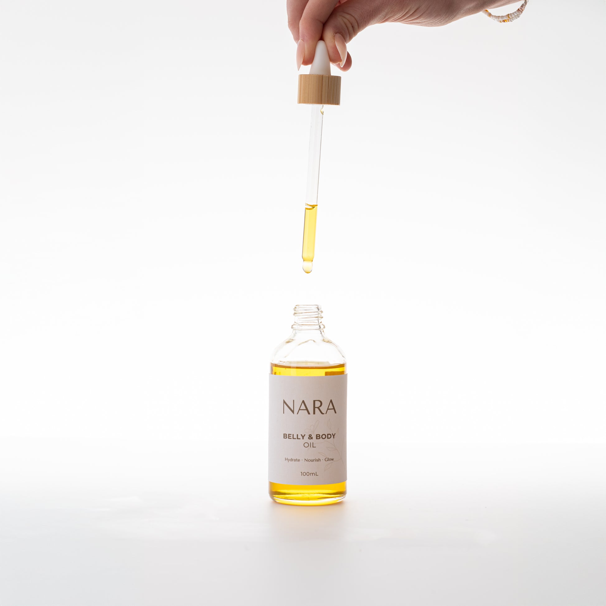 Natural Belly & Body Oil for women and mums is eco-friendly re-usable glass bottle / NARA