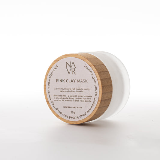 Natural Pink clay mask in eco-friendly container with wooden lid on a white background. Wellness for women / NARA